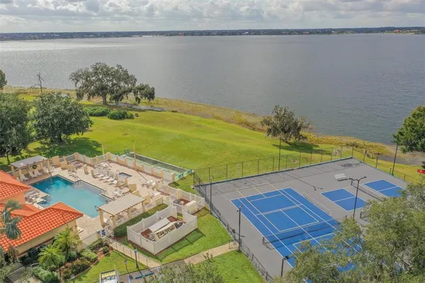 an aerial view of a house with a ocean view