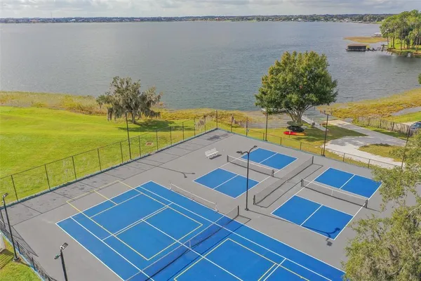 a view of a balcony with chairs
