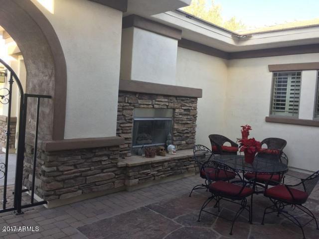 18083 West Narramore Road Goodyear, AZ 85338 - Photo 33 of 85 courtyard fireplace