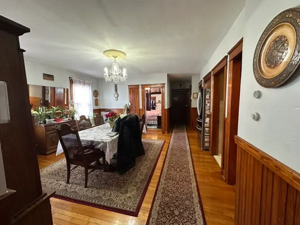a kitchen with a sink stove and wooden cabinets