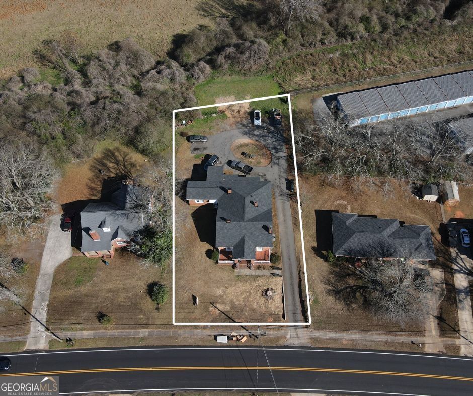 720 West Main Street Thomaston, GA 30286 - Photo 2 of 2 a view of a glass door