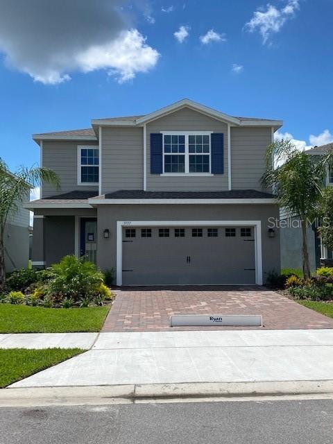 3937 Crawley Down Loop Sanford, FL 32773 - Photo 1 of 1 a house view with a garden space
