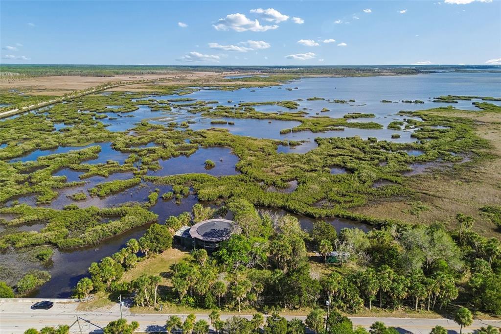 10501 Pine Island Drive Weeki Wachee, FL 34607 - Photo 21 of 54 a view of an ocean and beach