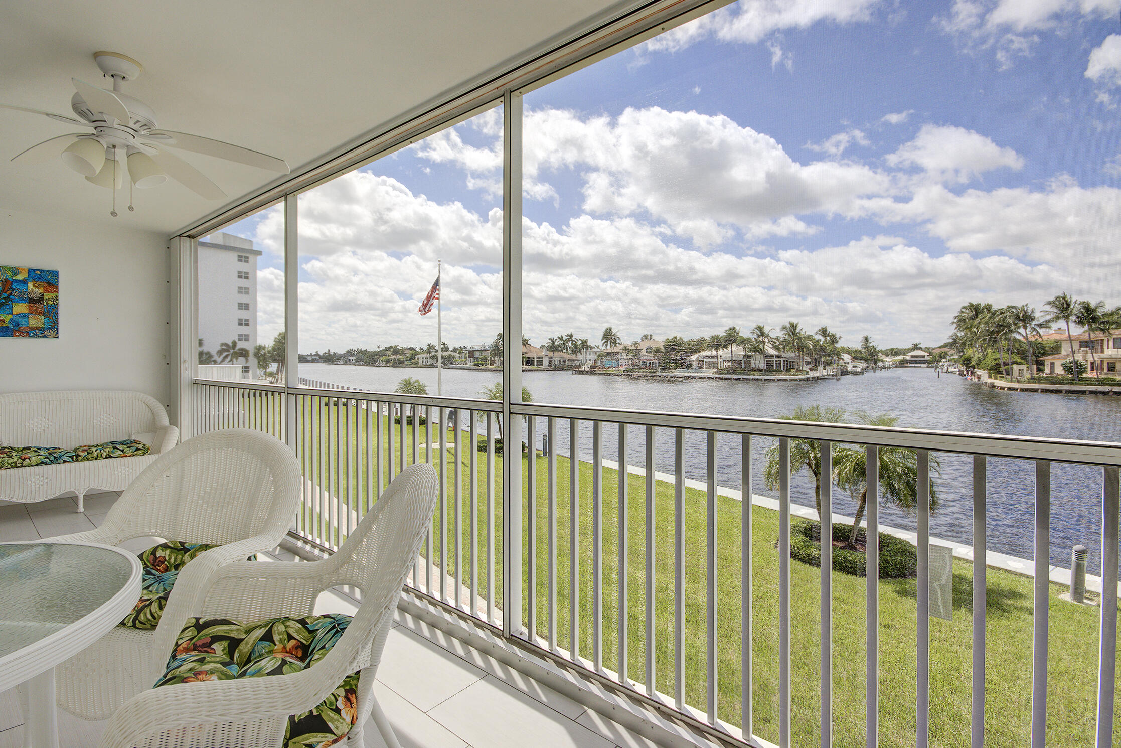 a balcony with furniture and city view