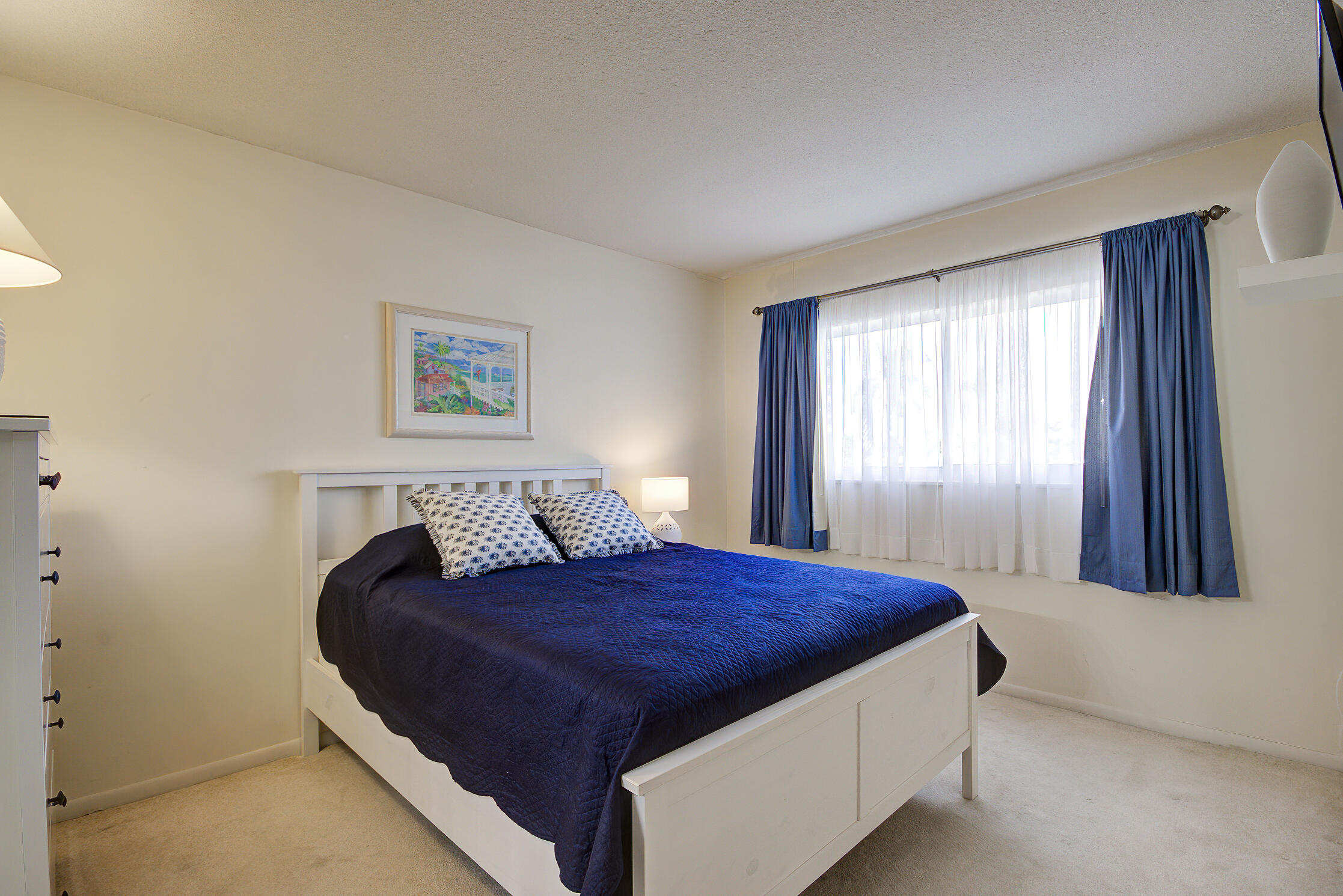 3100 South Ocean Boulevard, Unit 216 Highland Beach, FL 33487 - Photo 19 of 34 a bedroom with a bed and window