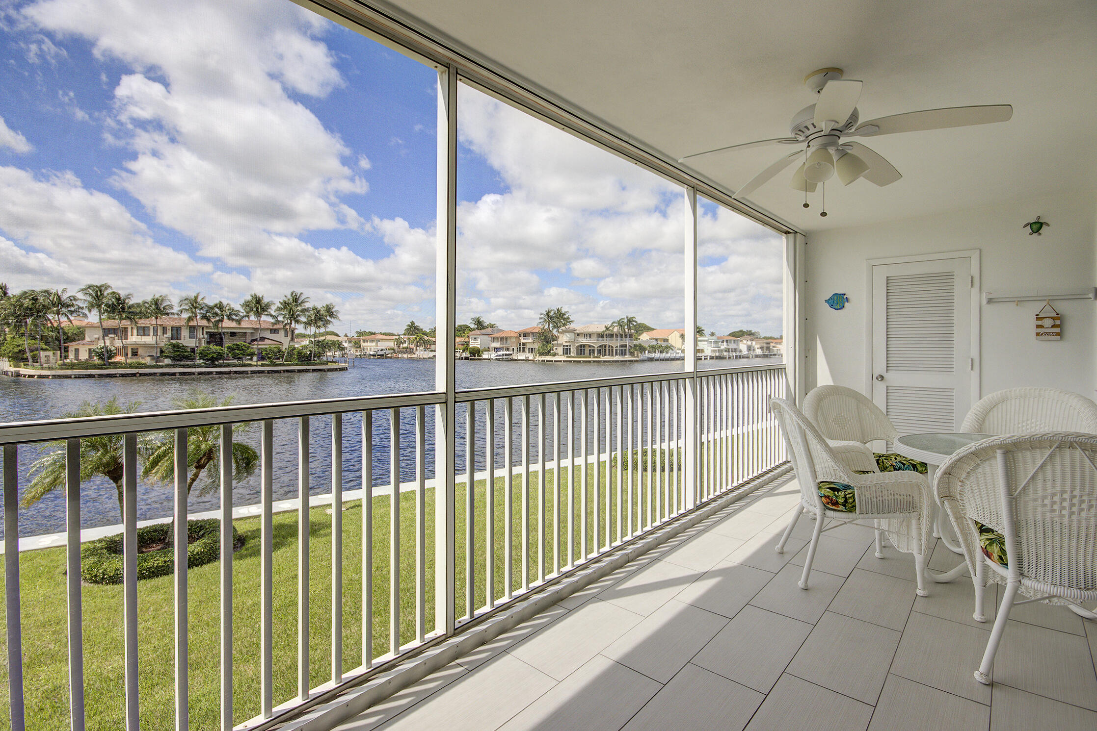 3100 South Ocean Boulevard, Unit 216 Highland Beach, FL 33487 - Photo 2 of 34 a view of a chairs and table in the balcony