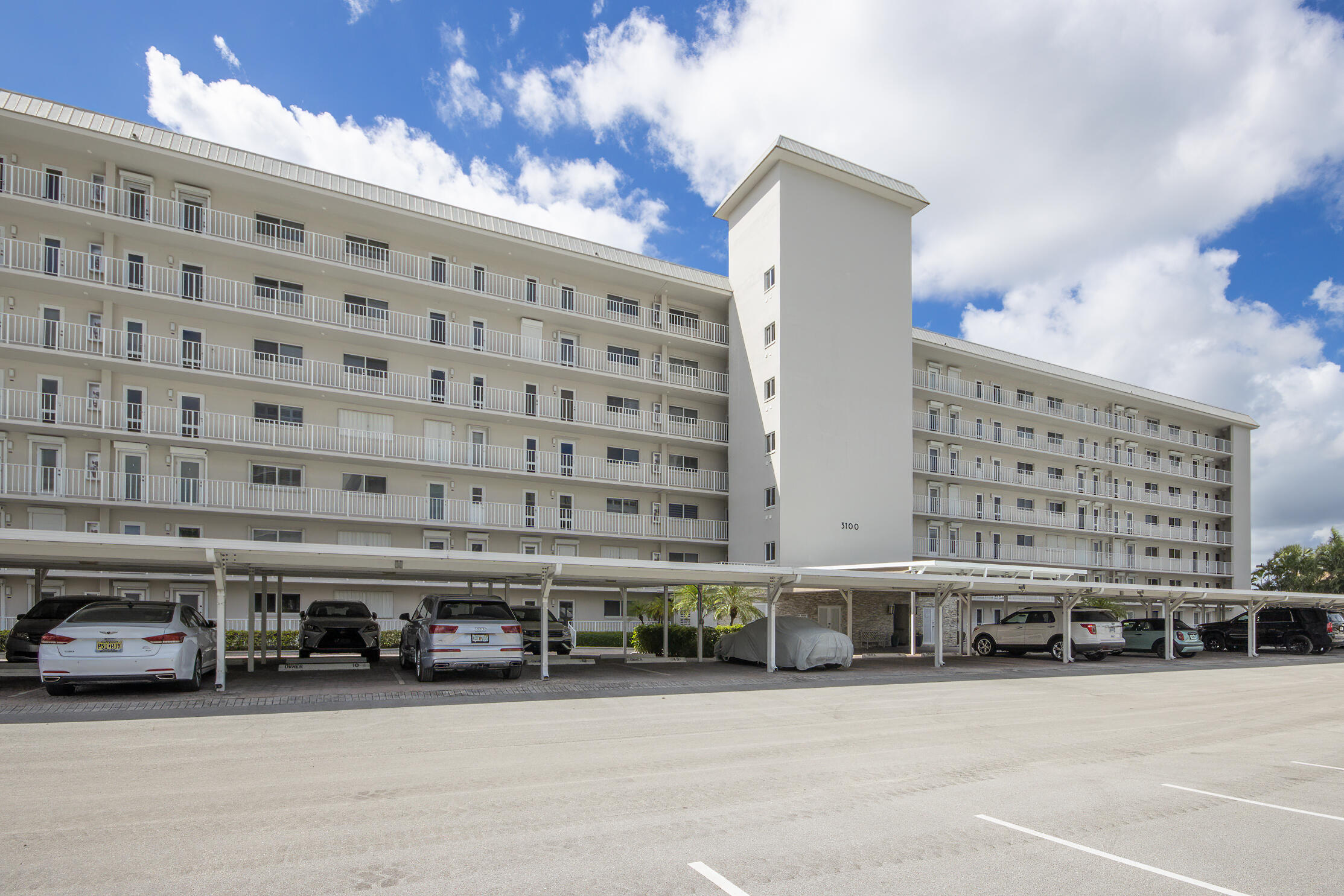 3100 South Ocean Boulevard, Unit 216 Highland Beach, FL 33487 - Photo 23 of 34 a large building with a street