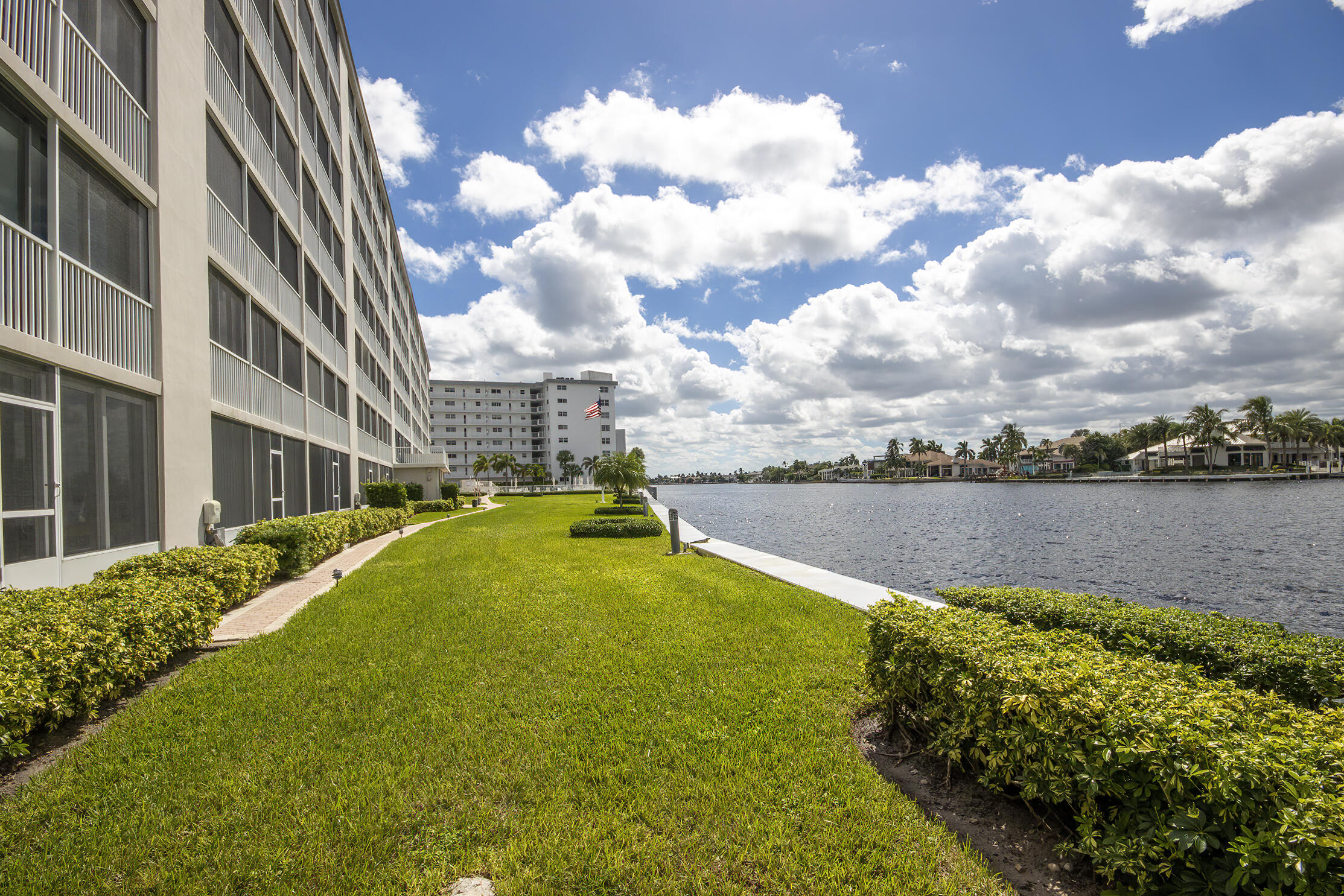 3100 South Ocean Boulevard, Unit 216 Highland Beach, FL 33487 - Photo 24 of 34 a view of a lake with a house in the background