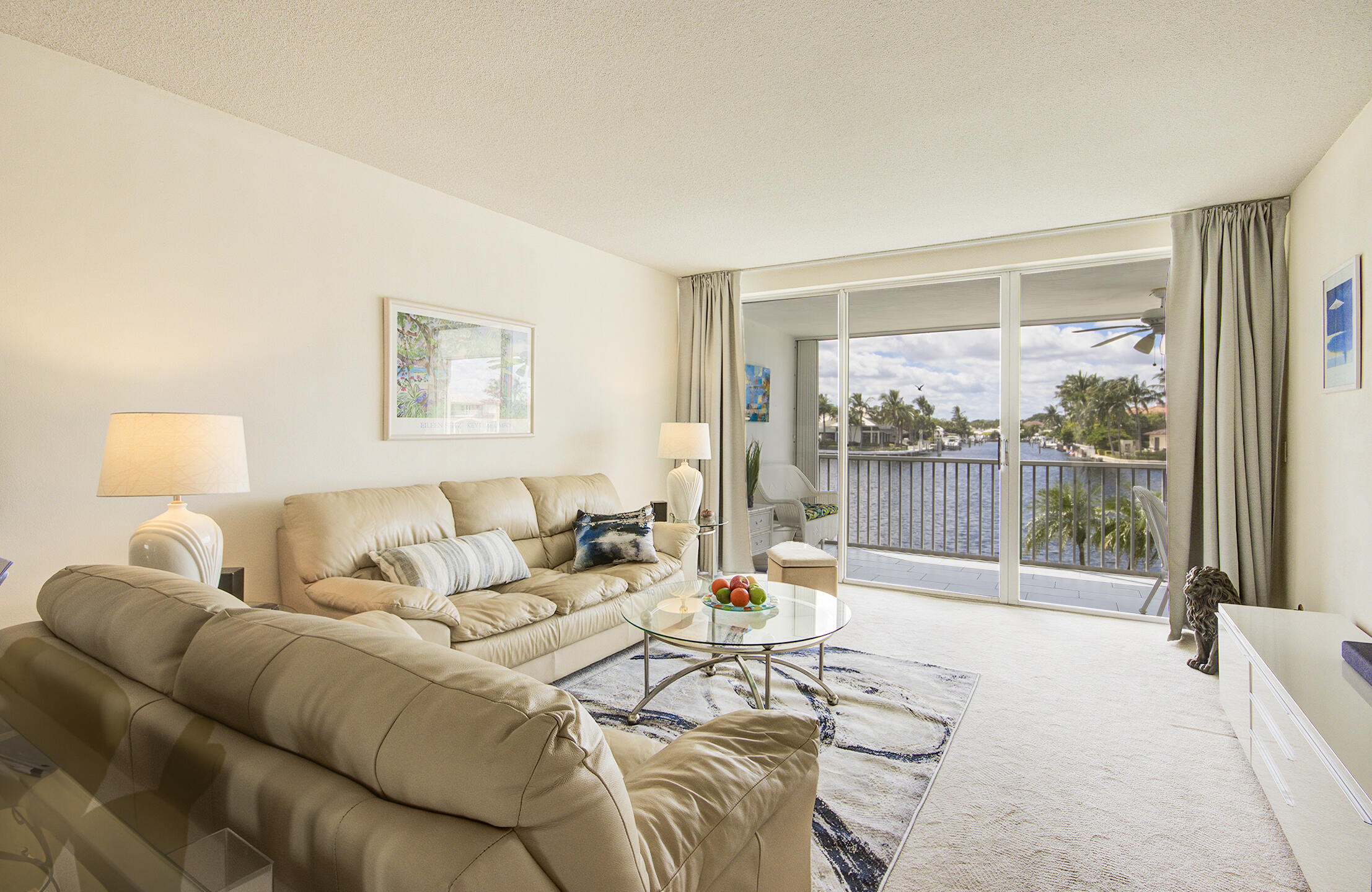 3100 South Ocean Boulevard, Unit 216 Highland Beach, FL 33487 - Photo 7 of 34 a living room with furniture and a large window