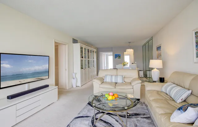 a kitchen that has a sink and a stove