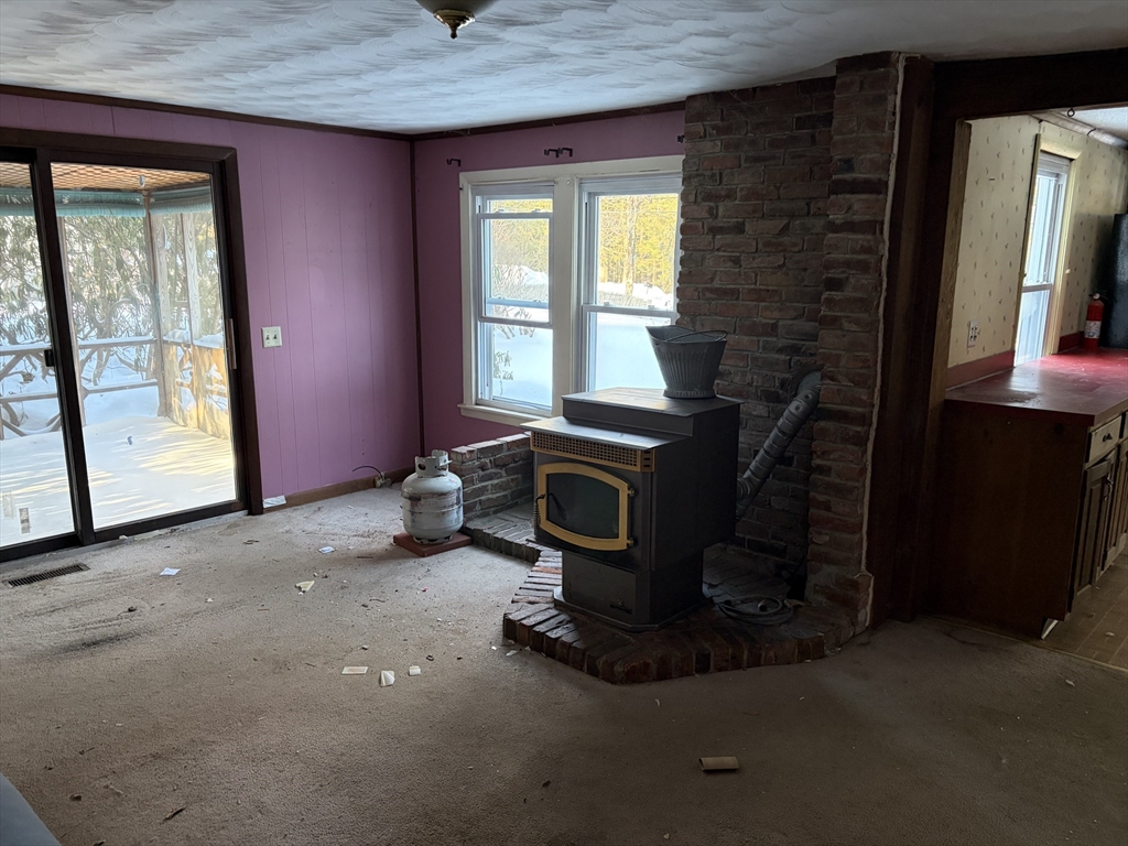 11 South Chesterfield Road Goshen, MA 01096 - Photo 13 of 30 a view of a livingroom with furniture and a fireplace
