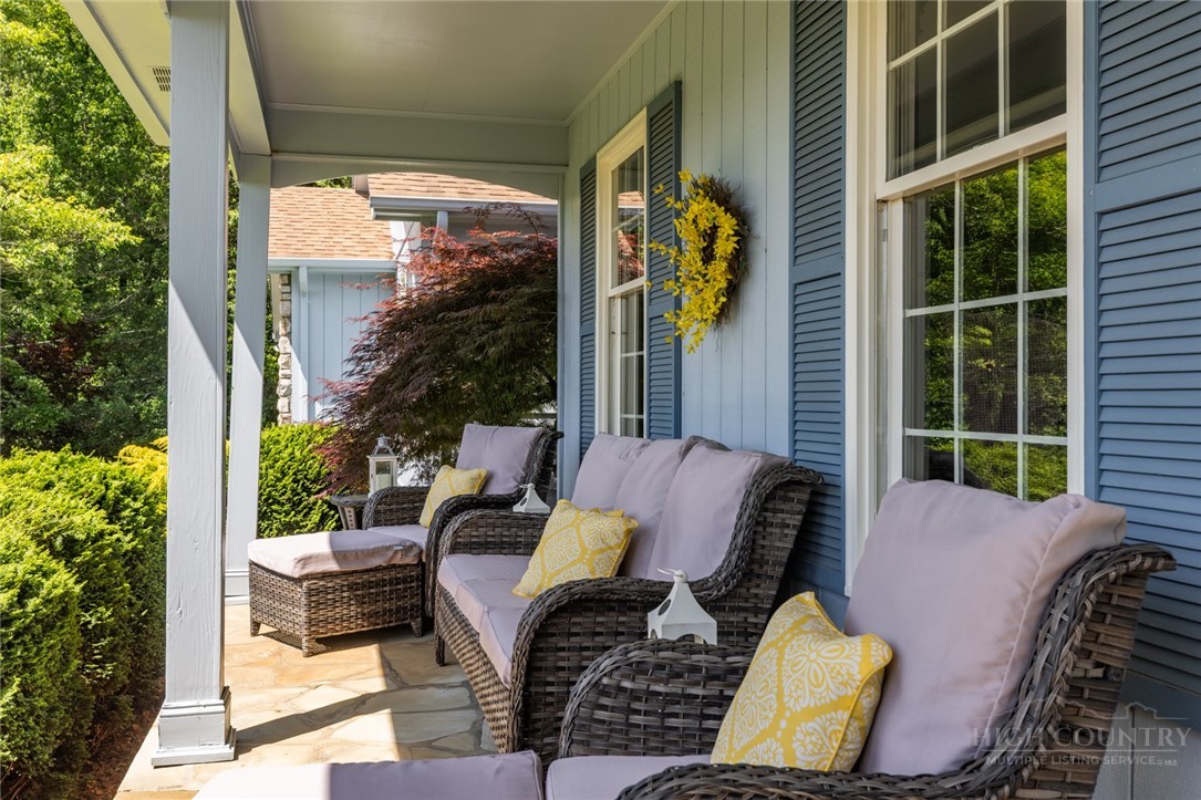 1335 Shingle Gap Road Purlear, NC 28665 - Photo 2 of 49 a view of balcony with a potted plant and a large window