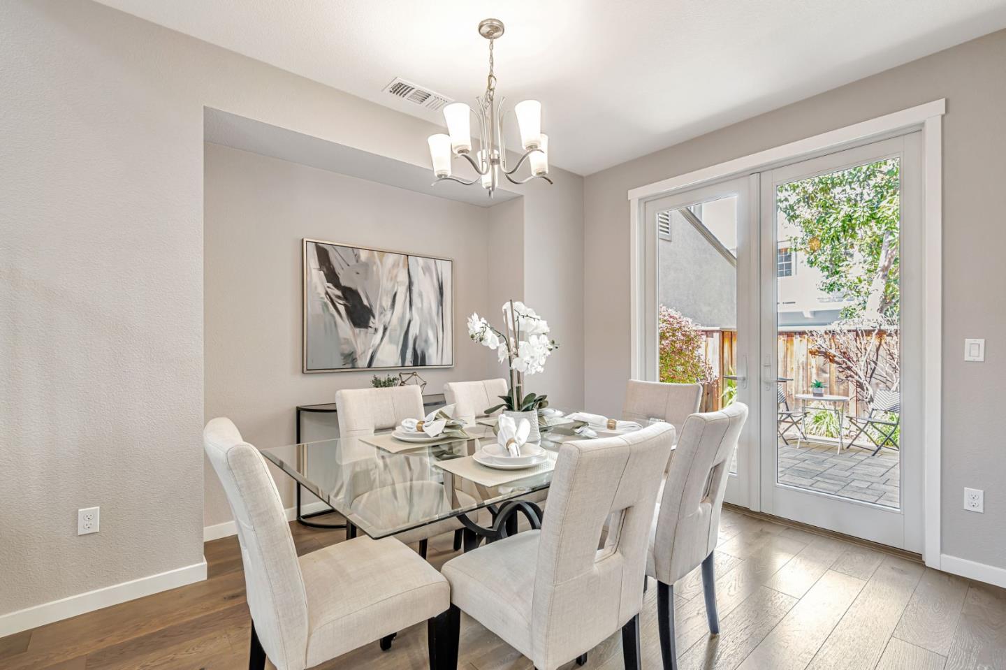310 Villa Street Mountain View, CA 94041 - Photo 16 of 40 a view of a dining room with furniture window and wooden floor
