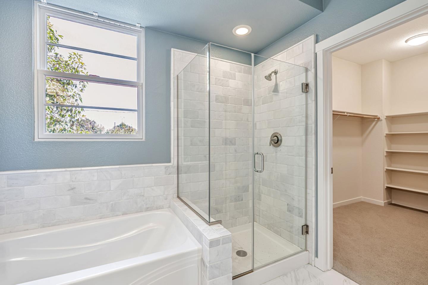 310 Villa Street Mountain View, CA 94041 - Photo 35 of 40 a bathroom with a bathtub and a shower