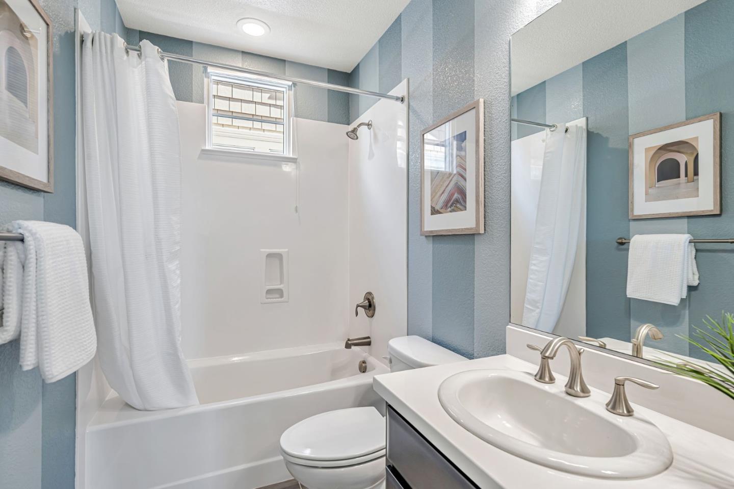 310 Villa Street Mountain View, CA 94041 - Photo 37 of 40 a bathroom with a sink toilet and shower