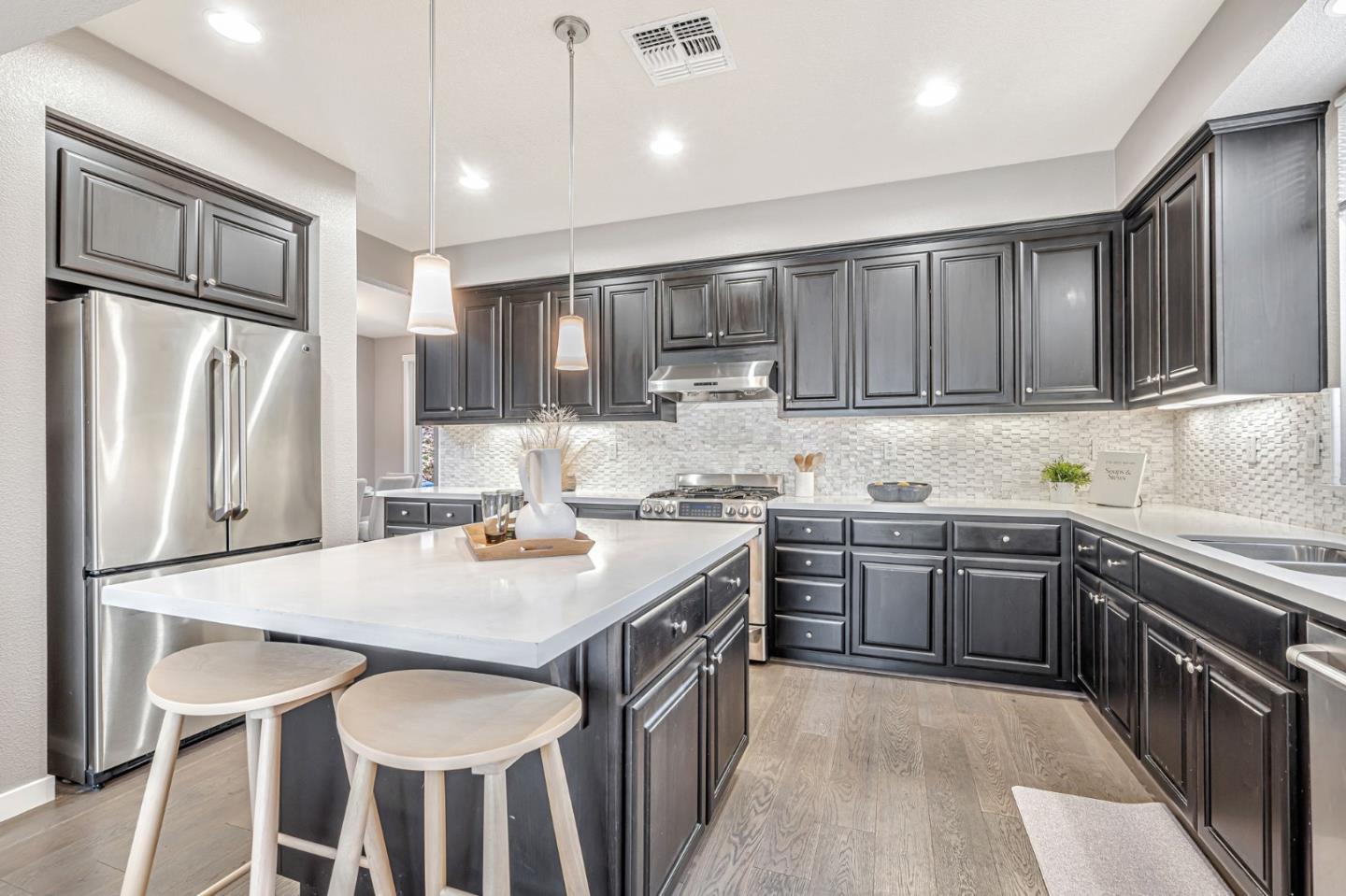 310 Villa Street Mountain View, CA 94041 - Photo 9 of 40 a kitchen with a sink stove and refrigerator