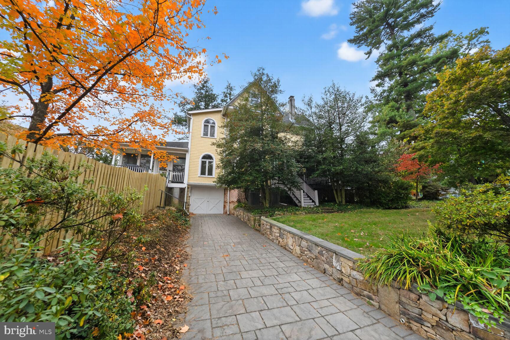 7427 Buffalo Avenue Takoma Park, MD 20912 - Photo 3 of 7 recently paved driveway for 2, new garage doors