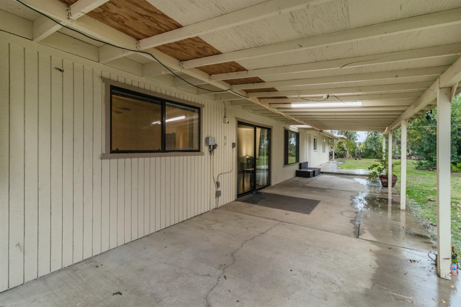 1783 North De Wolf Avenue Clovis, CA 93619 - Photo 28 of 39 a view of a hallway with wooden floor
