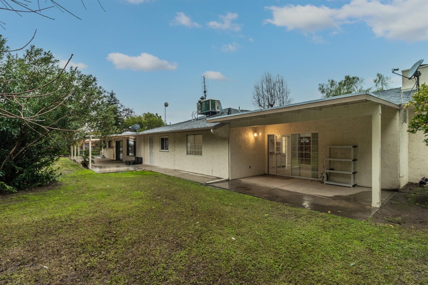 1783 North De Wolf Avenue Clovis, CA 93619 - Photo 36 of 39 a front view of a house with garden