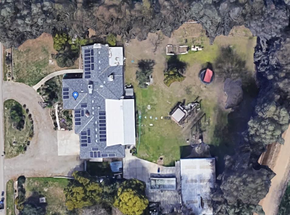 1783 North De Wolf Avenue Clovis, CA 93619 - Photo 37 of 39 an aerial view of a house with a yard and large trees