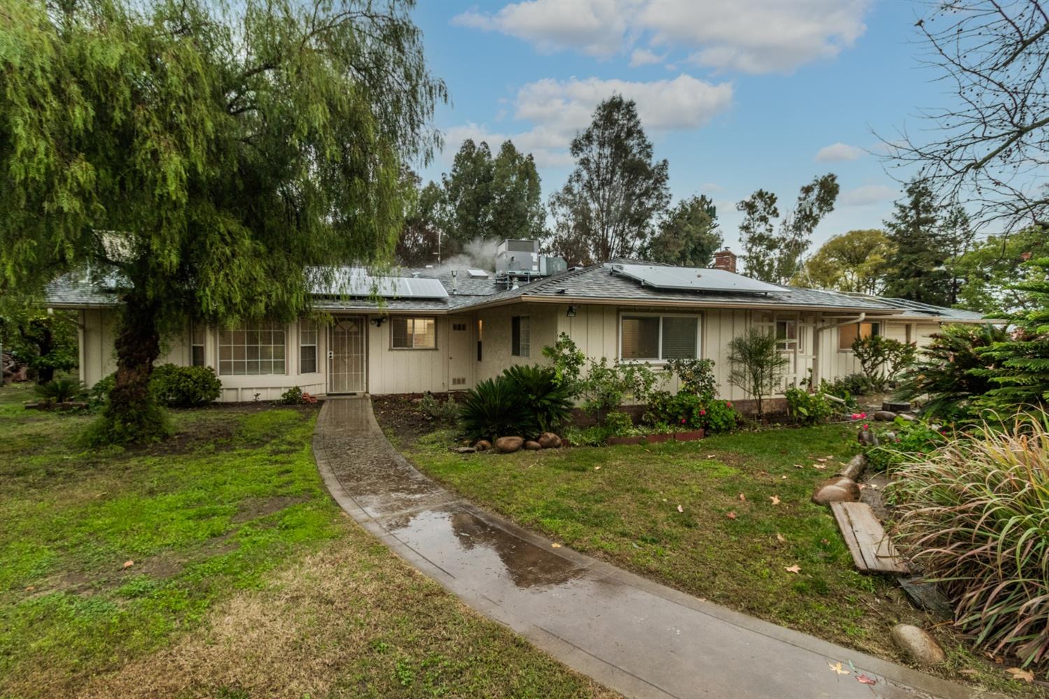 1783 North De Wolf Avenue Clovis, CA 93619 - Photo 38 of 39 a view of a house with a yard