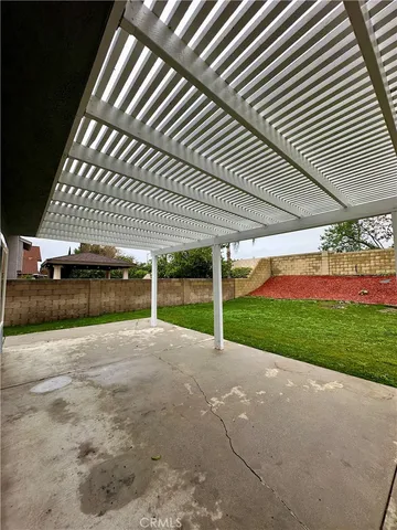 a view of a room that has a large window