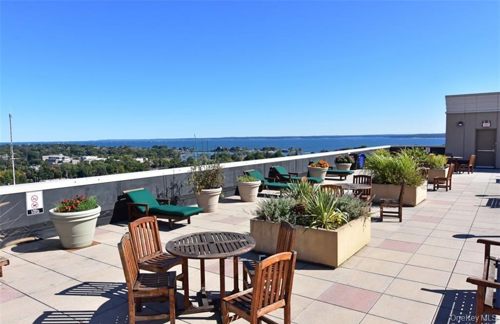 100 New Roc City Place, Unit 405 New Rochelle, NY 10801 - Photo 30 of 32 a view of a chair and table on the terrace