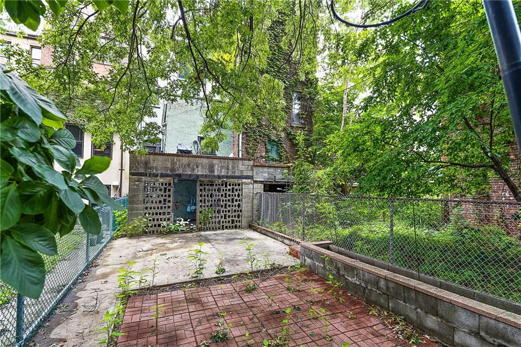 677 Saint Marks Avenue Brooklyn, NY 11216 - Photo 12 of 18 a view of a yard with plants