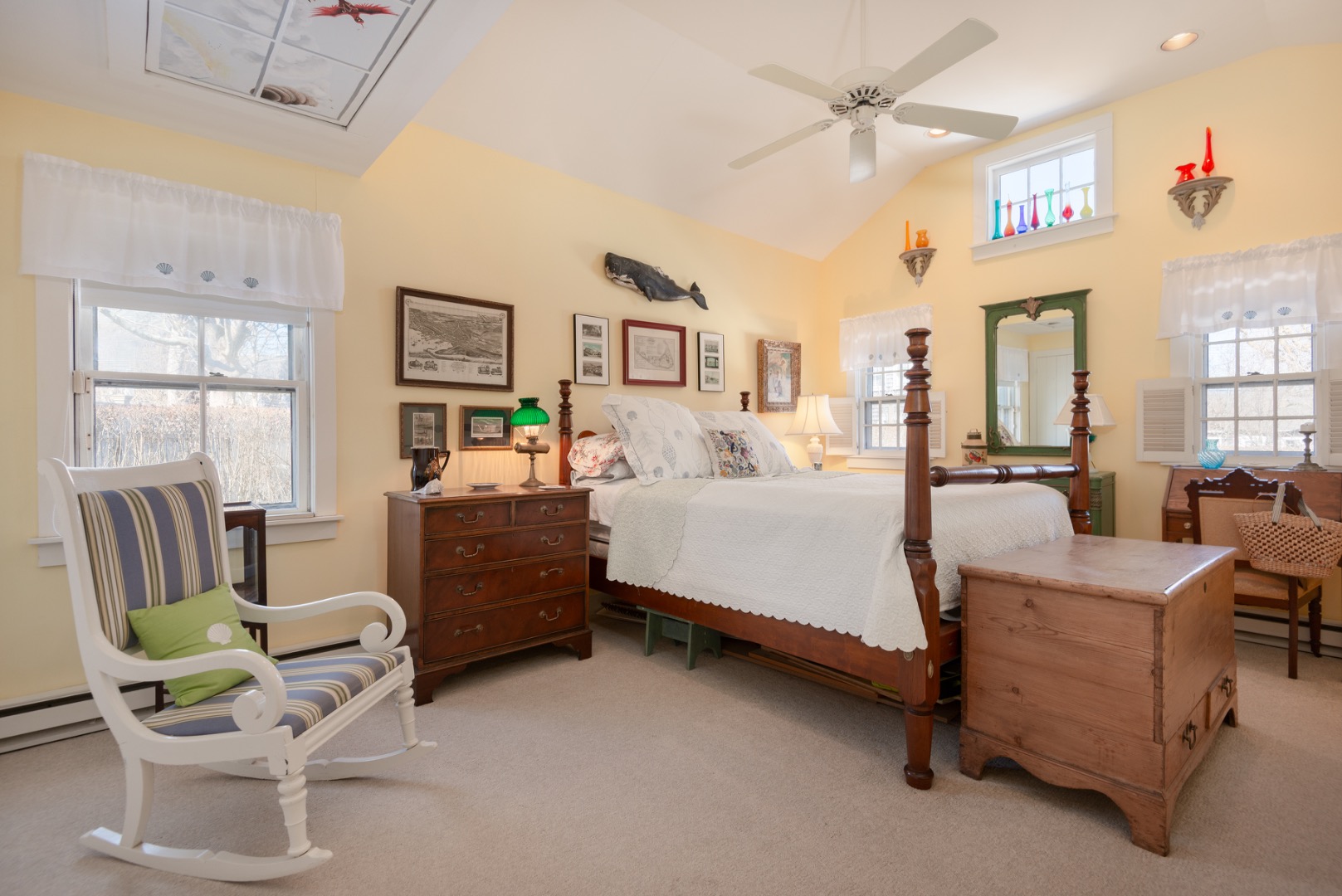 42 North Liberty Street Nantucket, MA 02554 - Photo 15 of 20 a bedroom with a bed and a chair