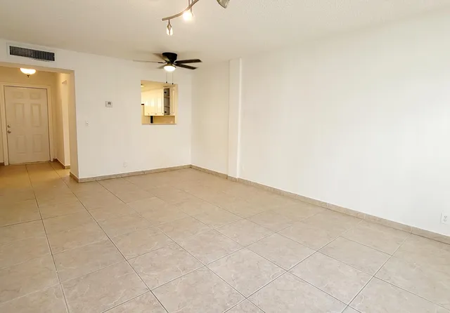 an empty room with a bathroom