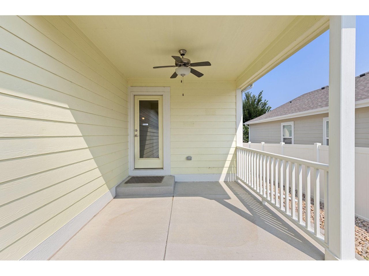 4231 Sunflower Road Evans, CO 80620 - Photo 3 of 29 Covered Patio with Ceiling fan