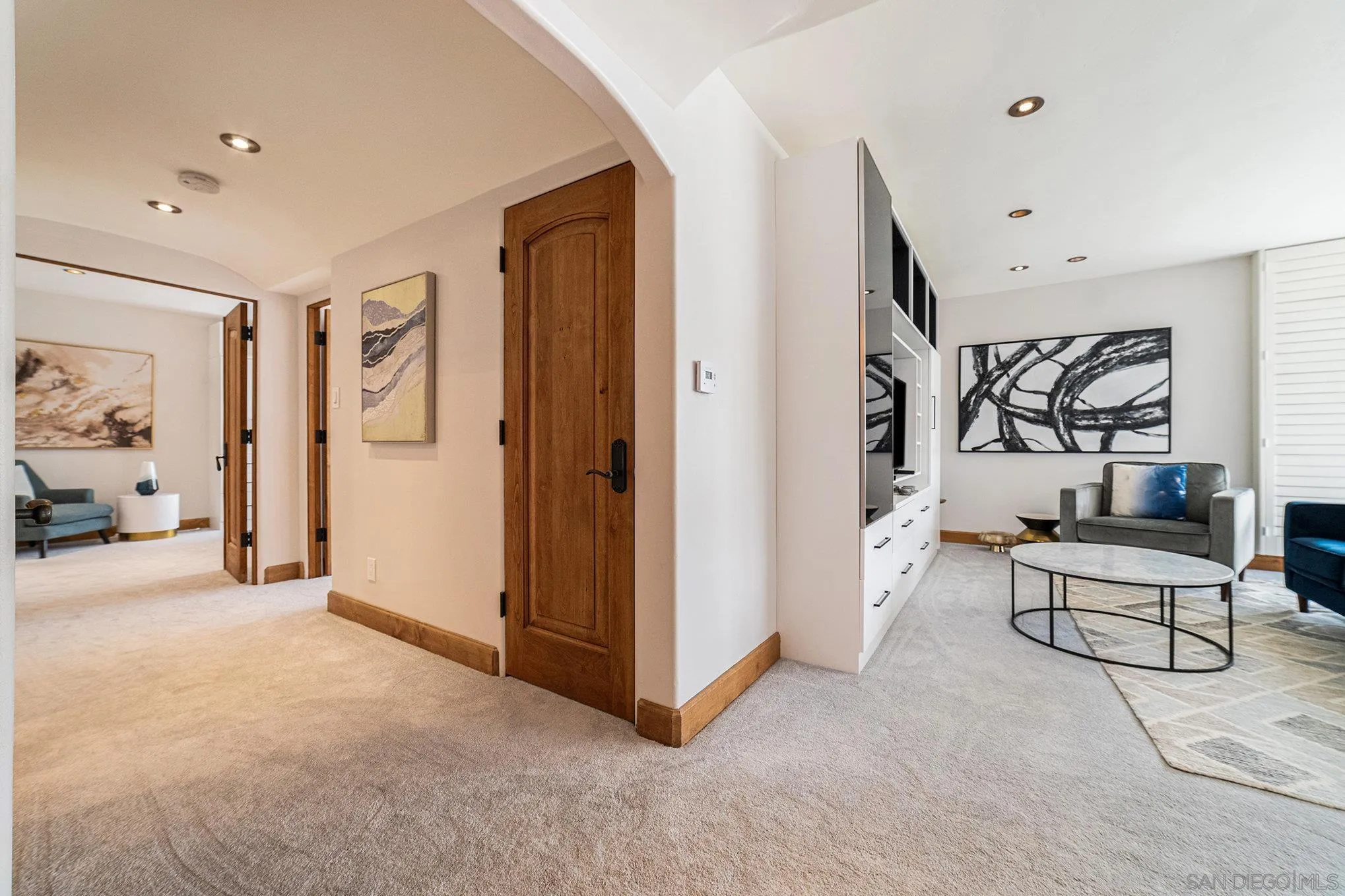 220 Coast Boulevard, Unit 2D La Jolla, CA 92037 - Photo 13 of 35 a view of a livingroom with couch and furniture