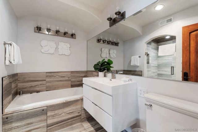 a bathroom with a sink and a bathtub