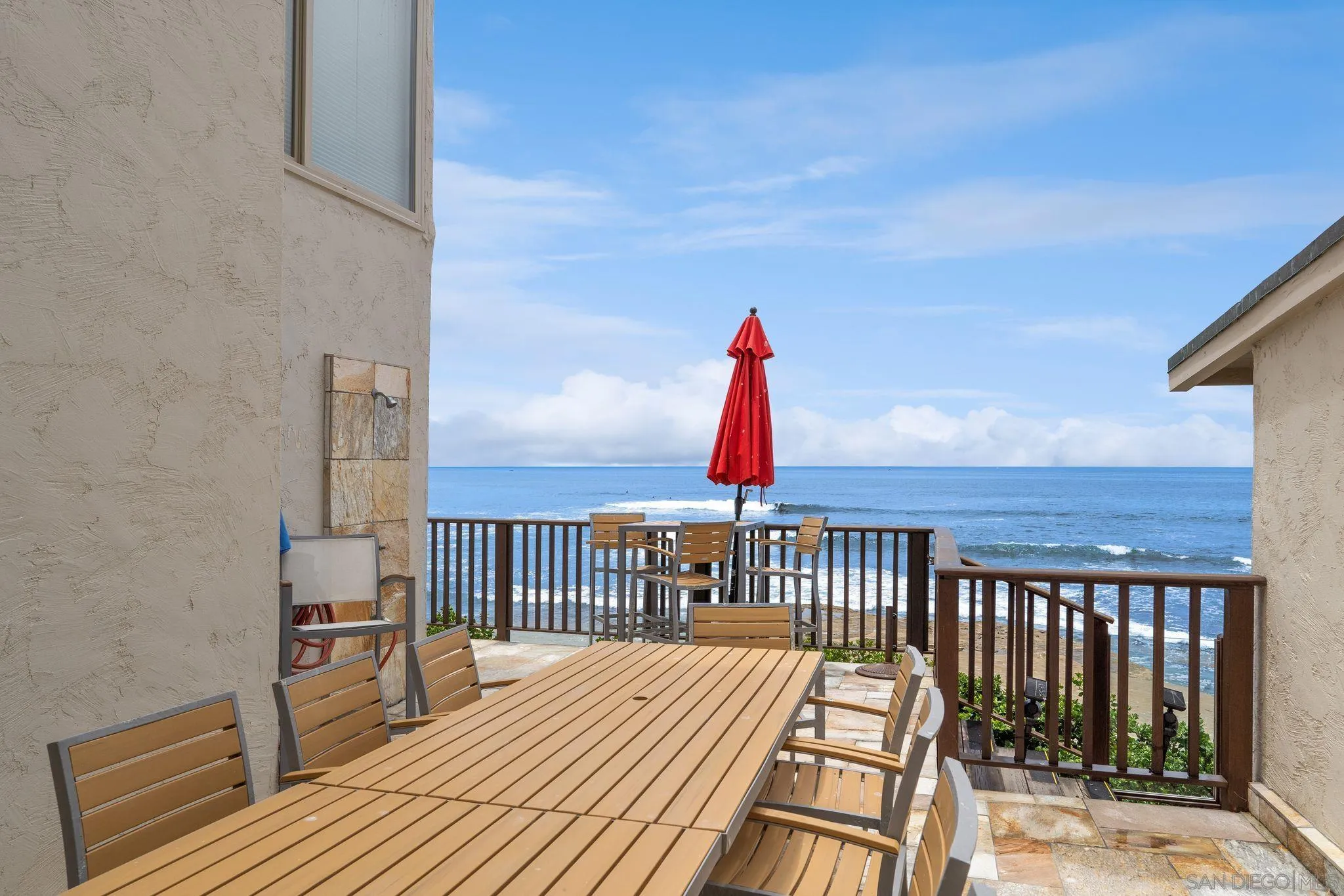 220 Coast Boulevard, Unit 2D La Jolla, CA 92037 - Photo 26 of 35 a view of balcony with wooden floor and fence