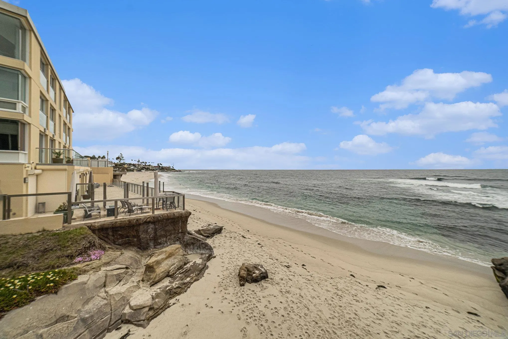 220 Coast Boulevard, Unit 2D La Jolla, CA 92037 - Photo 30 of 35 a view of an ocean and beach