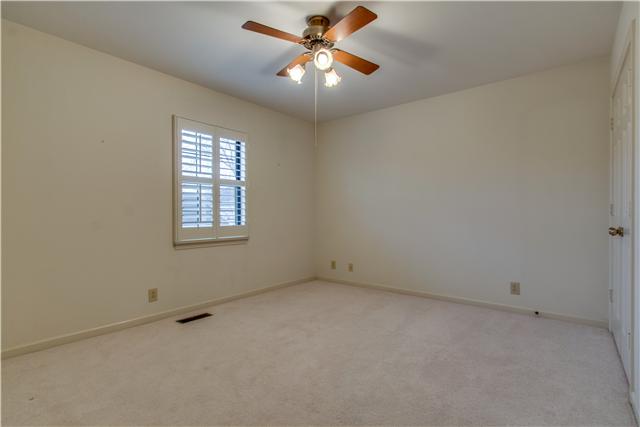 1305 General George Patton Road Nashville, TN 37221 - Photo 11 of 17 2nd bedroom is 13 x 11 and has plantation shutters and ceiling fan.