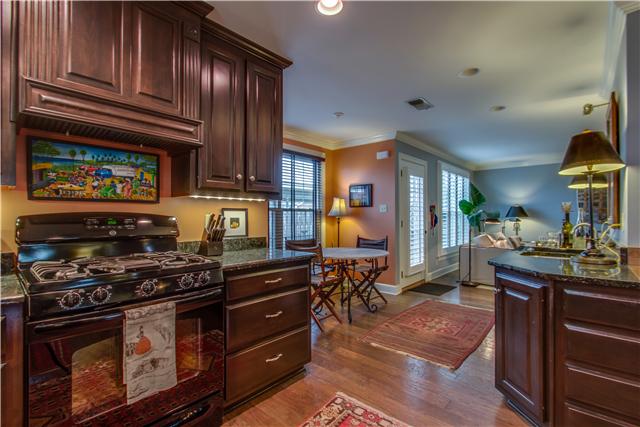 1305 General George Patton Road Nashville, TN 37221 - Photo 6 of 17 Bay window and breakfast nook on the left. Wet bar with stainless sink on the right.