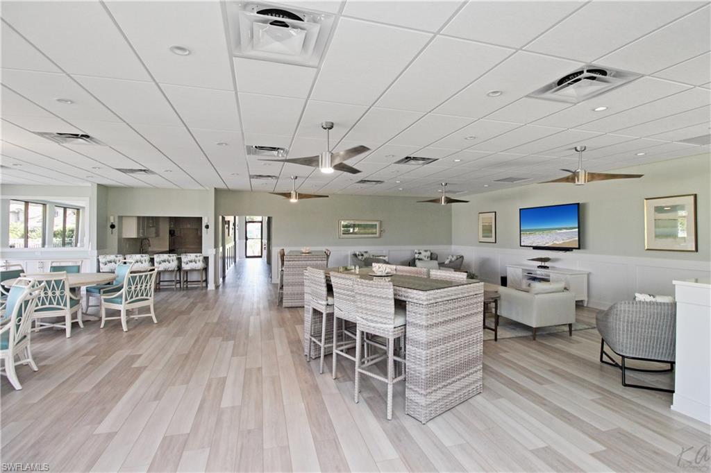 4028 Crayton Road, Unit C3 Naples, FL 34103 - Photo 20 of 32 a very nice looking room with a large window