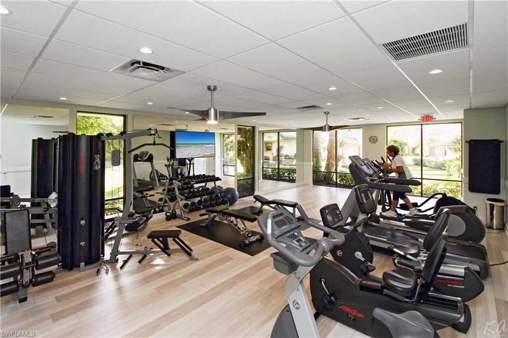4028 Crayton Road, Unit C3 Naples, FL 34103 - Photo 21 of 32 a view of a room with gym equipment