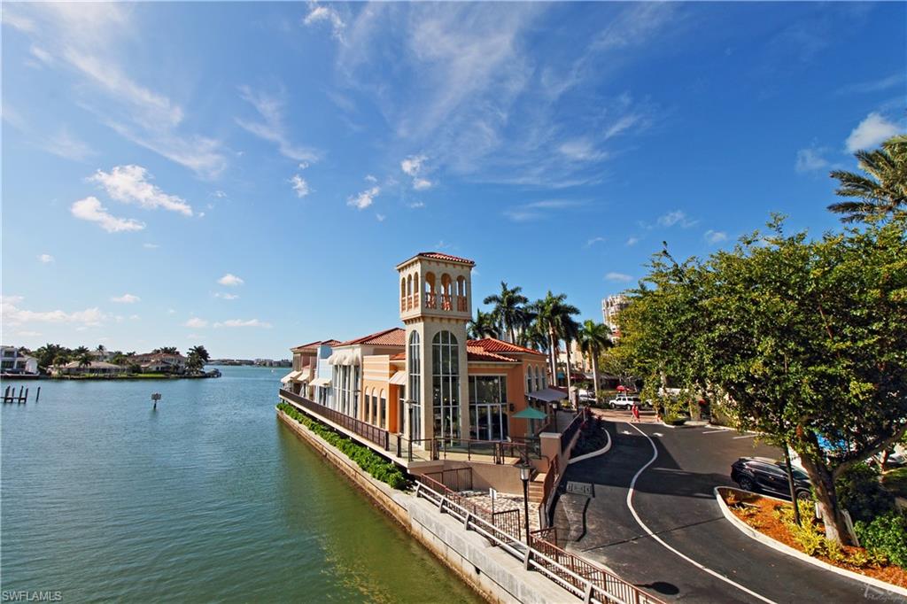 4028 Crayton Road, Unit C3 Naples, FL 34103 - Photo 26 of 32 a view of a balcony with chairs