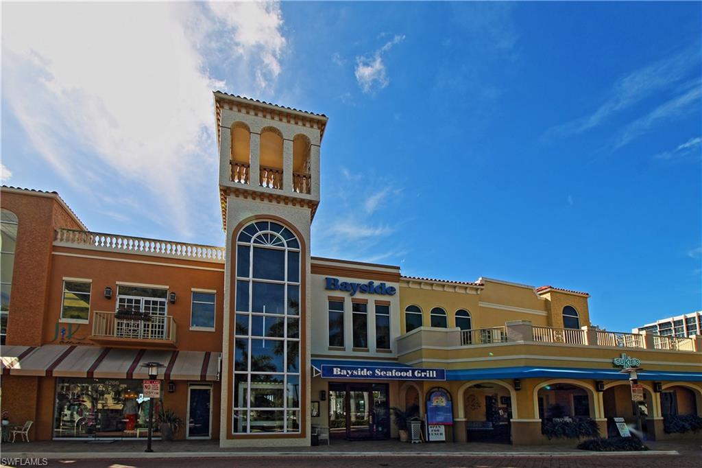 4028 Crayton Road, Unit C3 Naples, FL 34103 - Photo 30 of 32 front view of a building