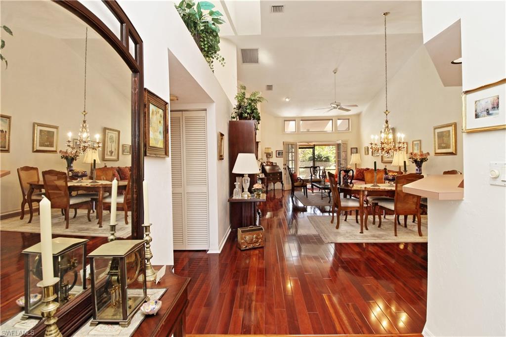 4028 Crayton Road, Unit C3 Naples, FL 34103 - Photo 8 of 32 a view of a living room and dining room