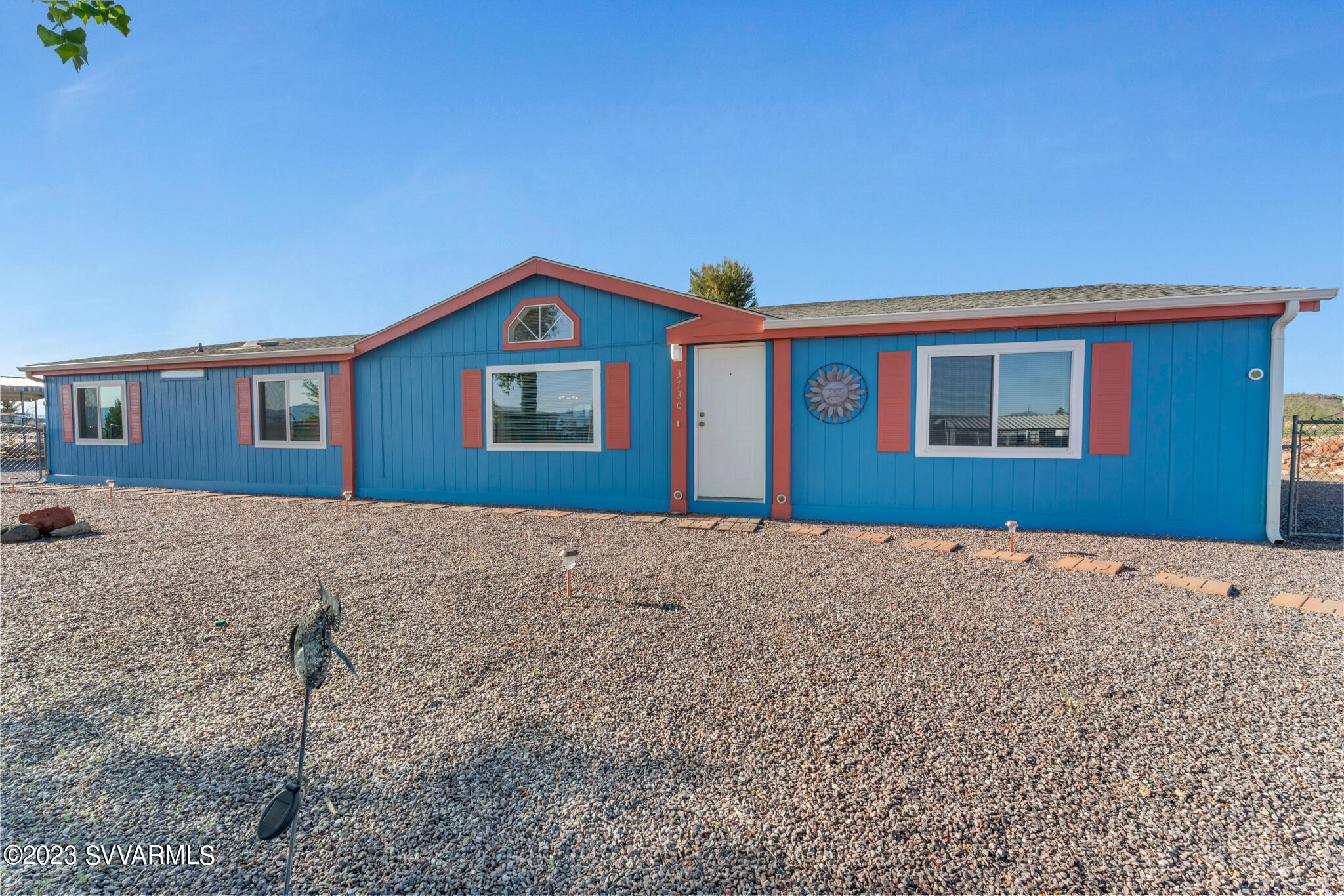 3730 East Beaver Creek Road Rimrock, AZ 86335 - Photo 2 of 49 a front view of a house with a yard