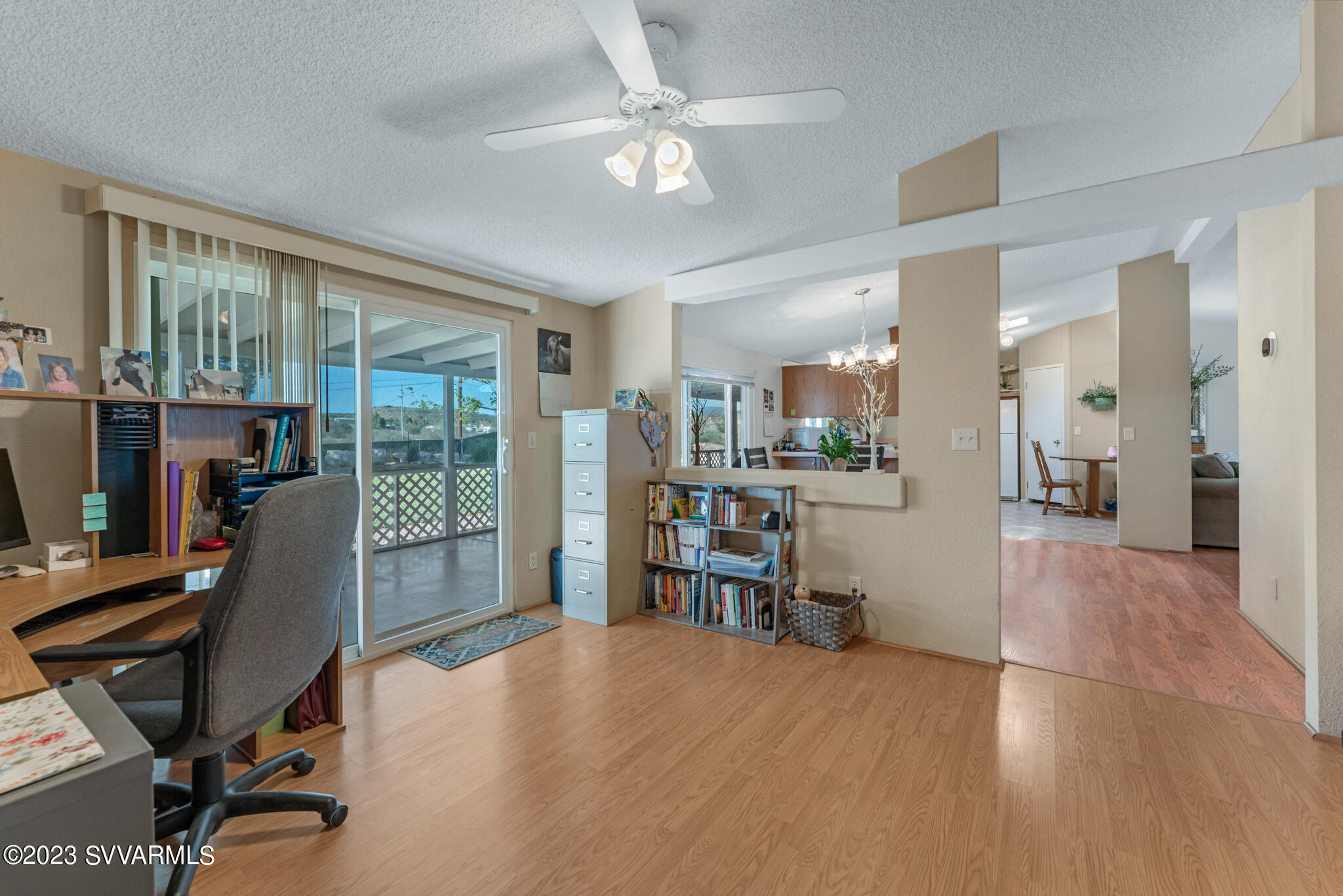 3730 East Beaver Creek Road Rimrock, AZ 86335 - Photo 38 of 49 a view of a workspace with furniture and a livingroom