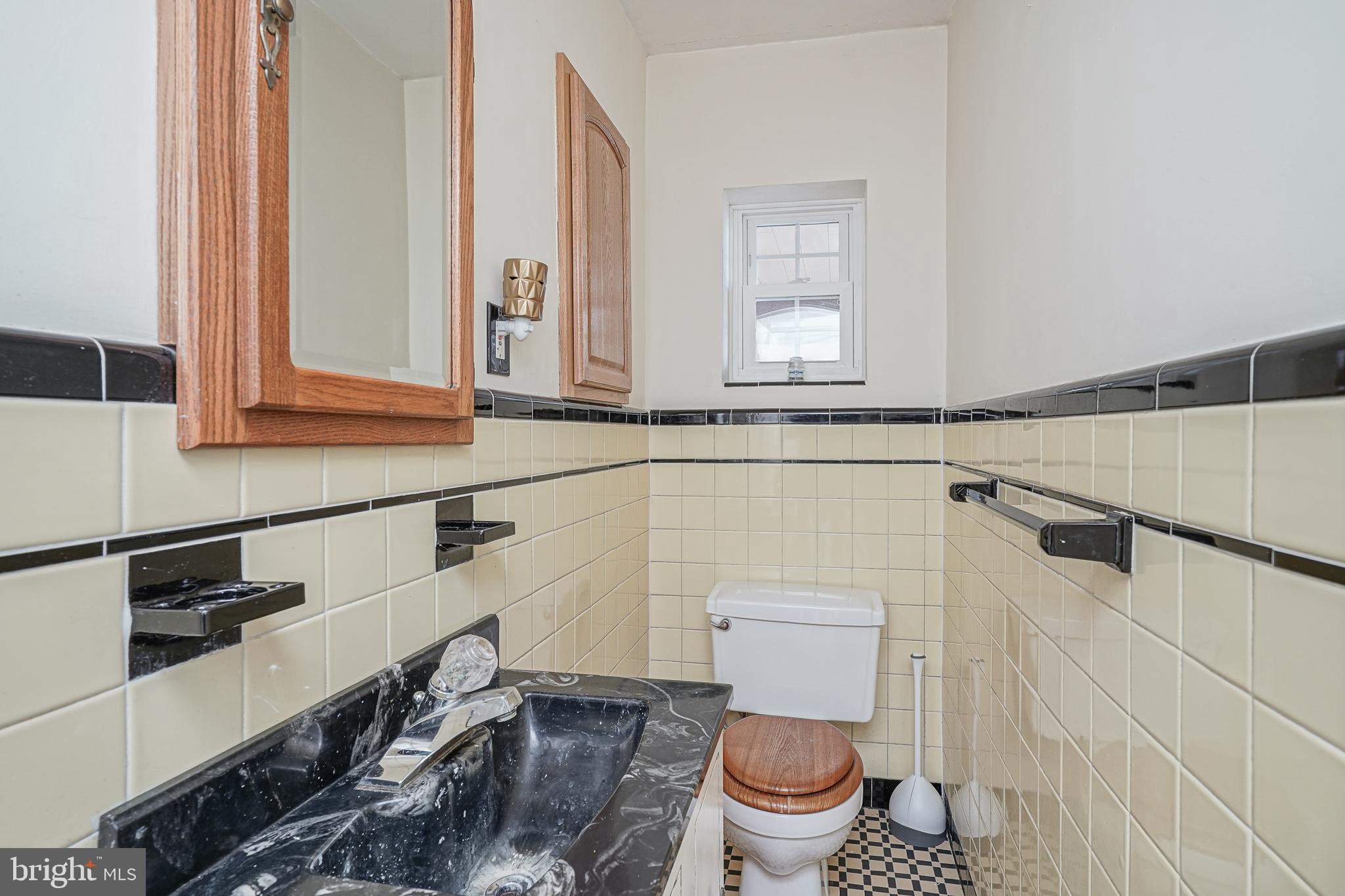 64 Pancoast Boulevard Delran, NJ 08075 - Photo 12 of 45 a bathroom with a toilet a sink and a window