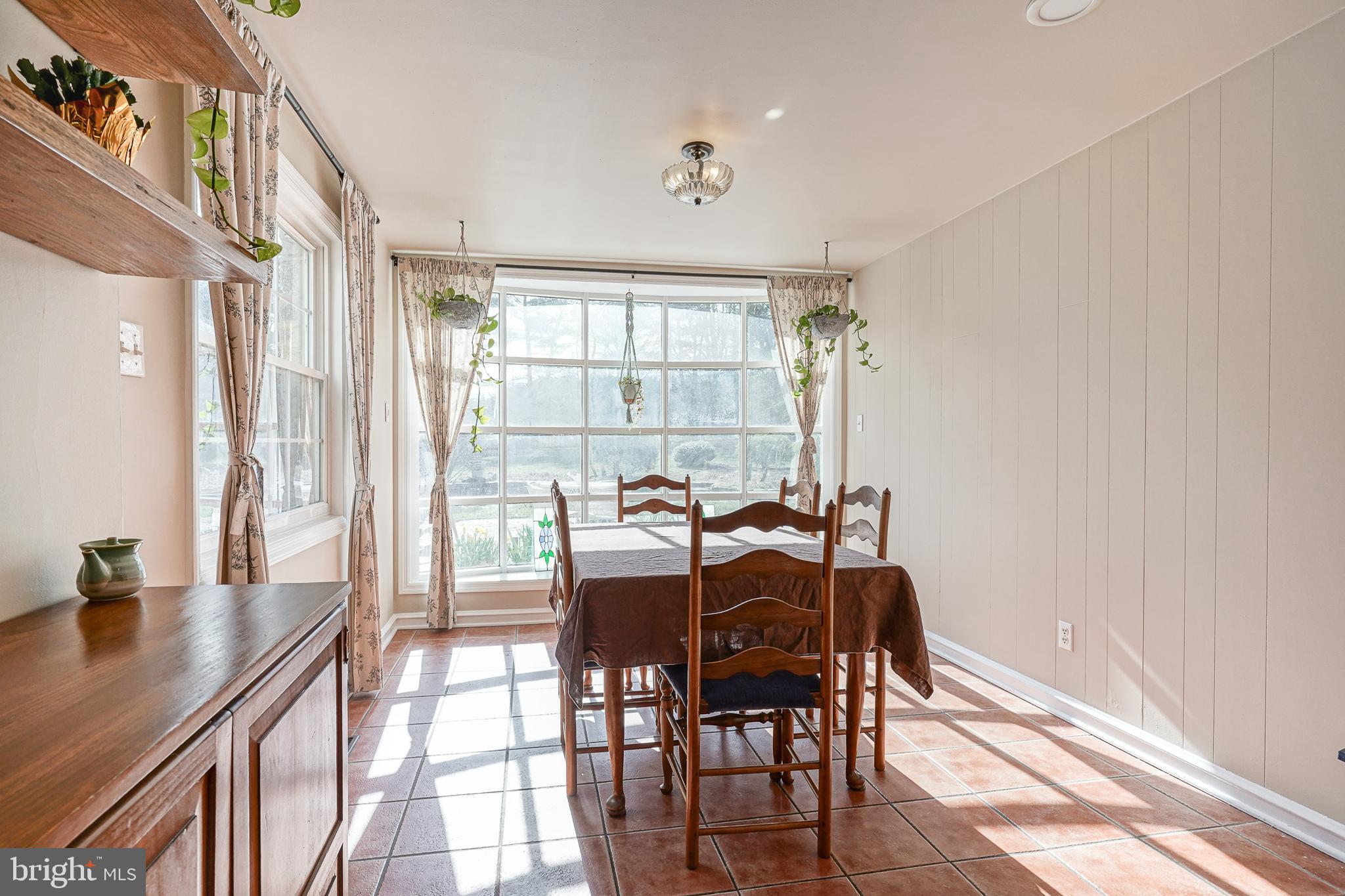 64 Pancoast Boulevard Delran, NJ 08075 - Photo 13 of 45 a view of a dining room with furniture window and outside view