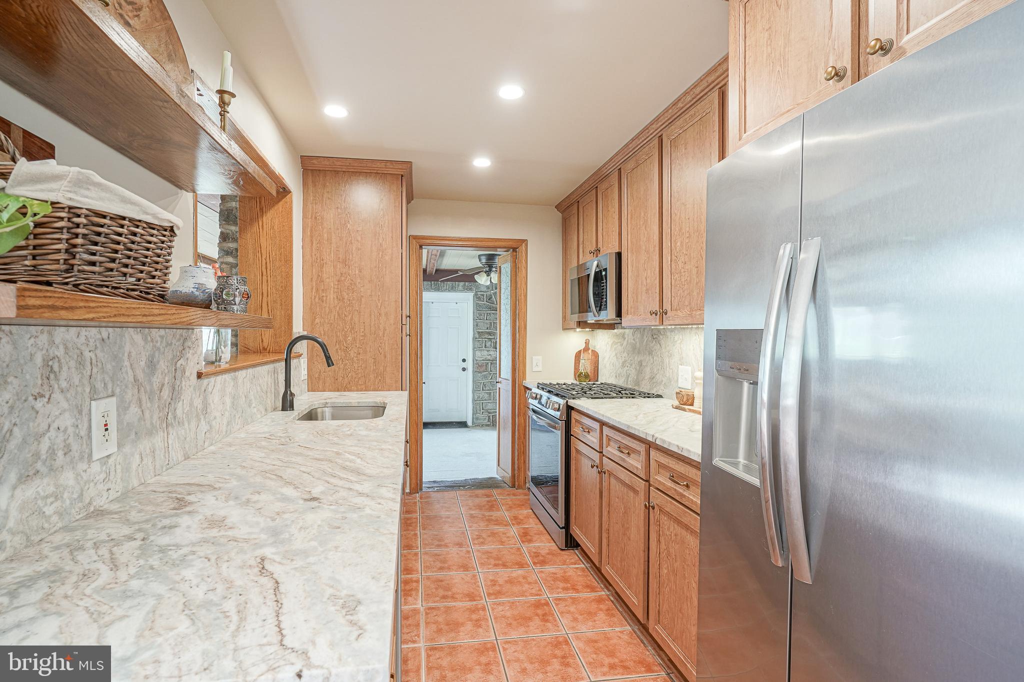 64 Pancoast Boulevard Delran, NJ 08075 - Photo 15 of 45 a large kitchen with stainless steel appliances kitchen island granite countertop a refrigerator a sink and dishwasher