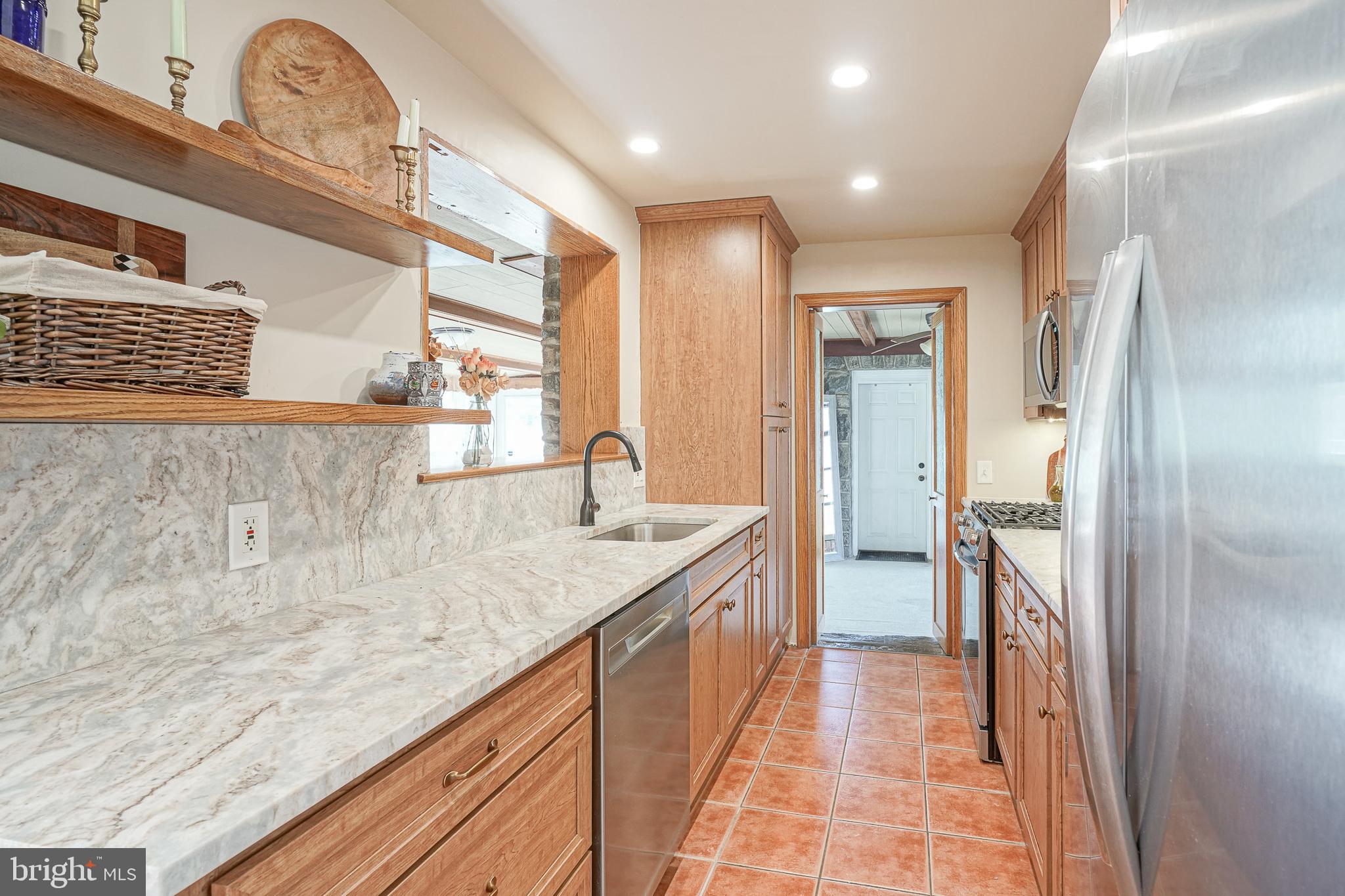 64 Pancoast Boulevard Delran, NJ 08075 - Photo 16 of 45 a bathroom with a granite countertop sink a mirror and a shower