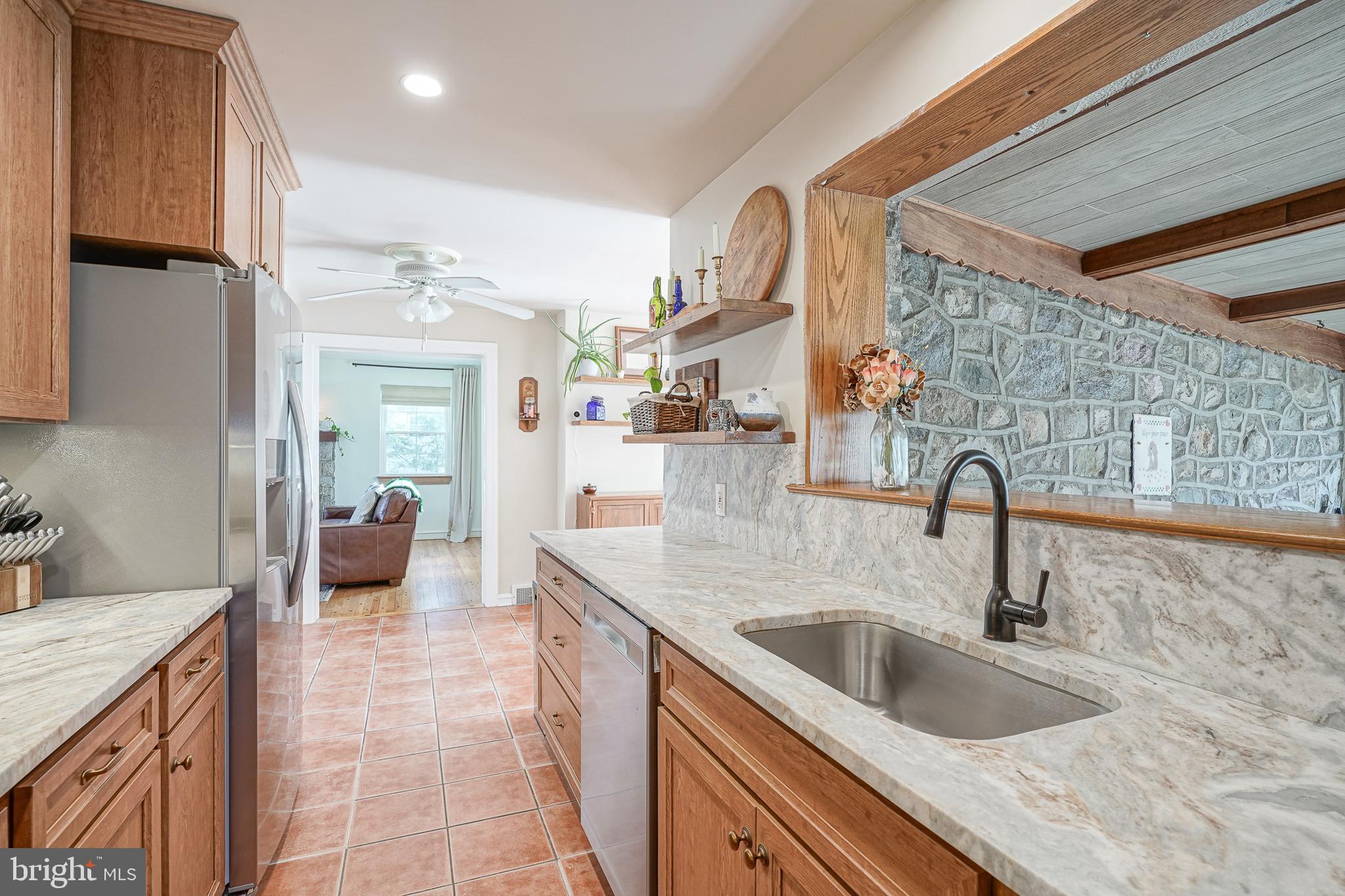 64 Pancoast Boulevard Delran, NJ 08075 - Photo 19 of 45 a kitchen with a sink and a refrigerator