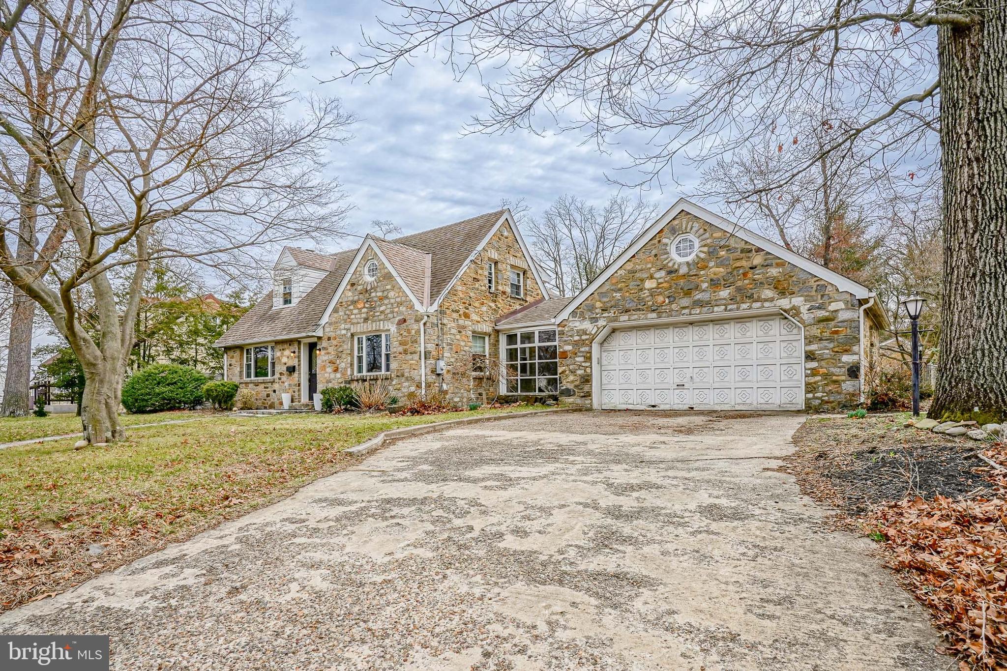 64 Pancoast Boulevard Delran, NJ 08075 - Photo 3 of 45 a front view of a house with a yard and garage